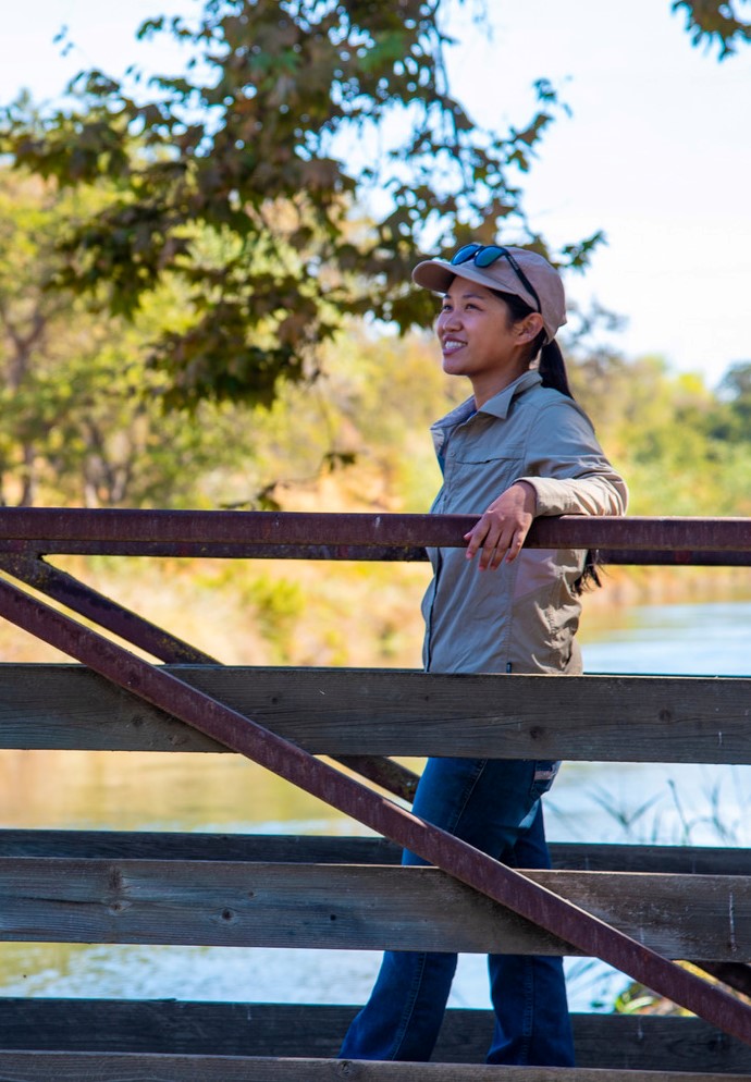 Kaitlyn Chow standing on a bridge
